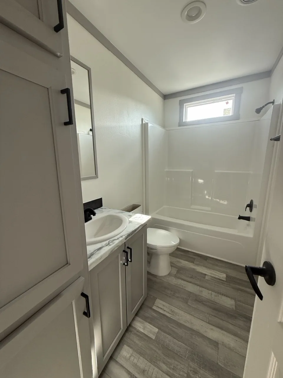 Modern bathroom inside The Coleman manufactured home in Texas