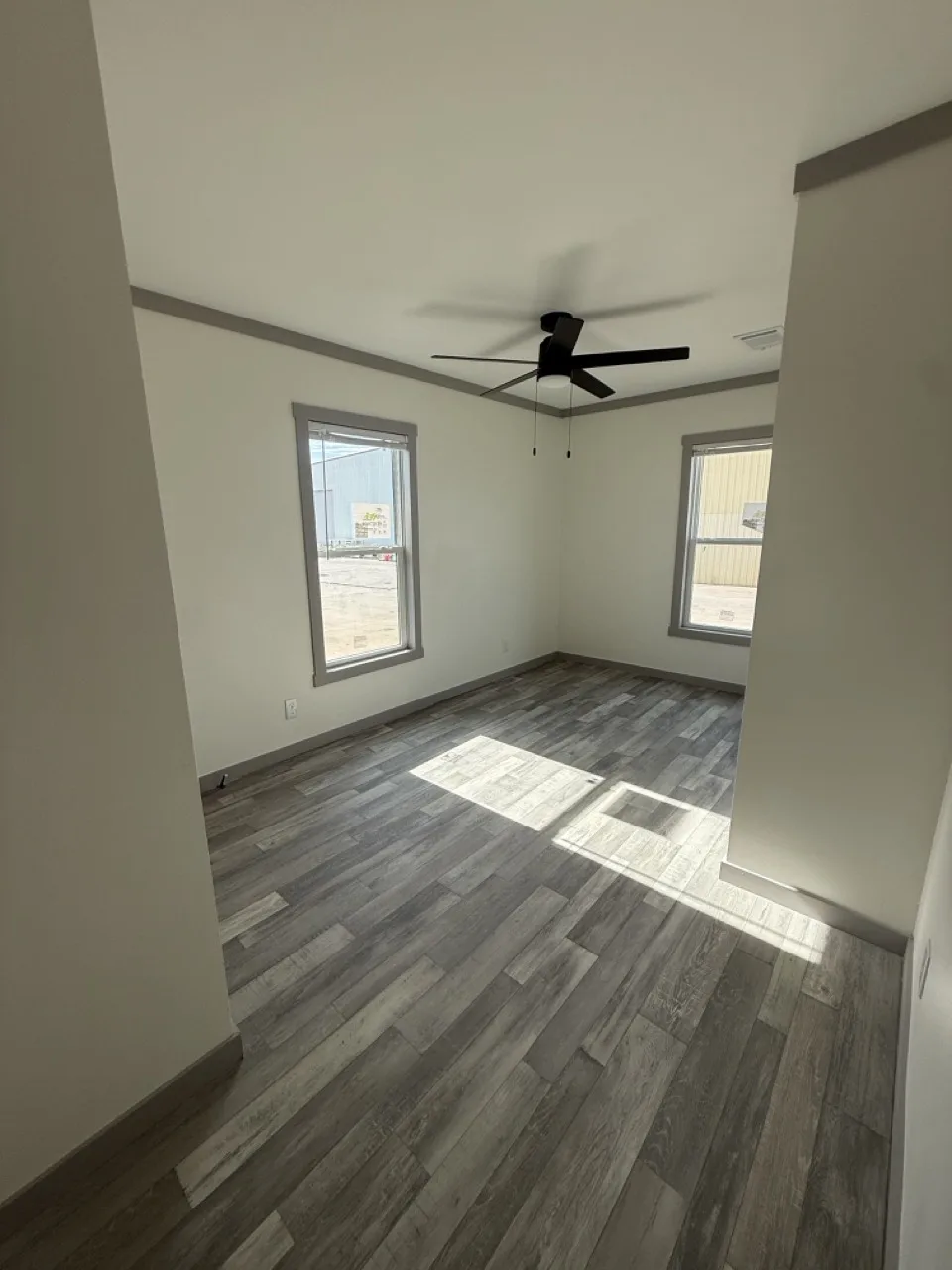 Primary bedroom in The Coleman doublewide home with private ensuite bathroom